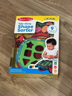 Melissa & Doug Take-Along Shape Sorter - Green, Red, Blue, Yellow
